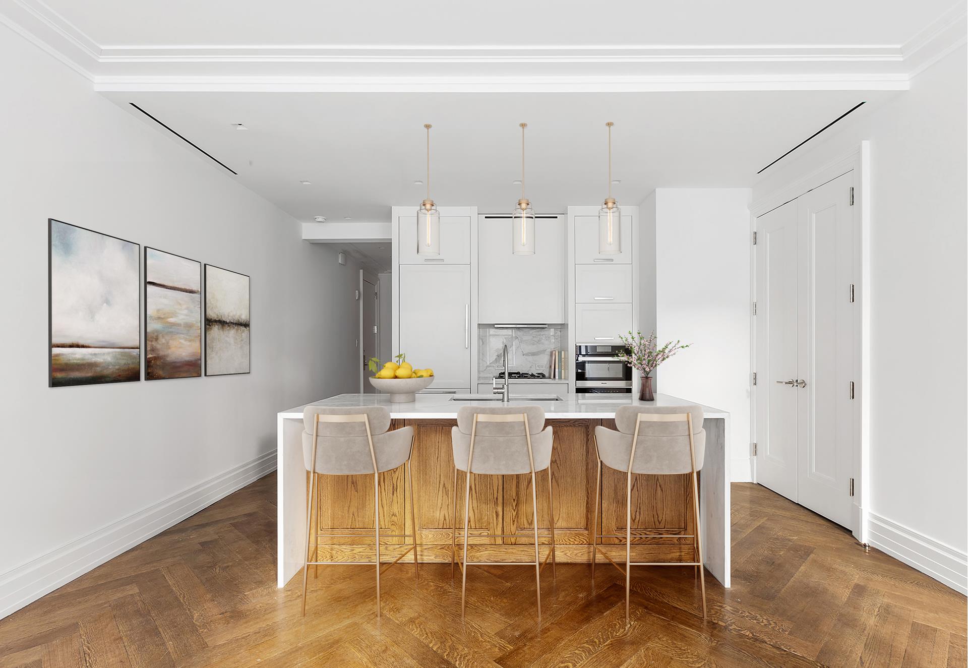 a kitchen with a dining table chairs and white cabinets