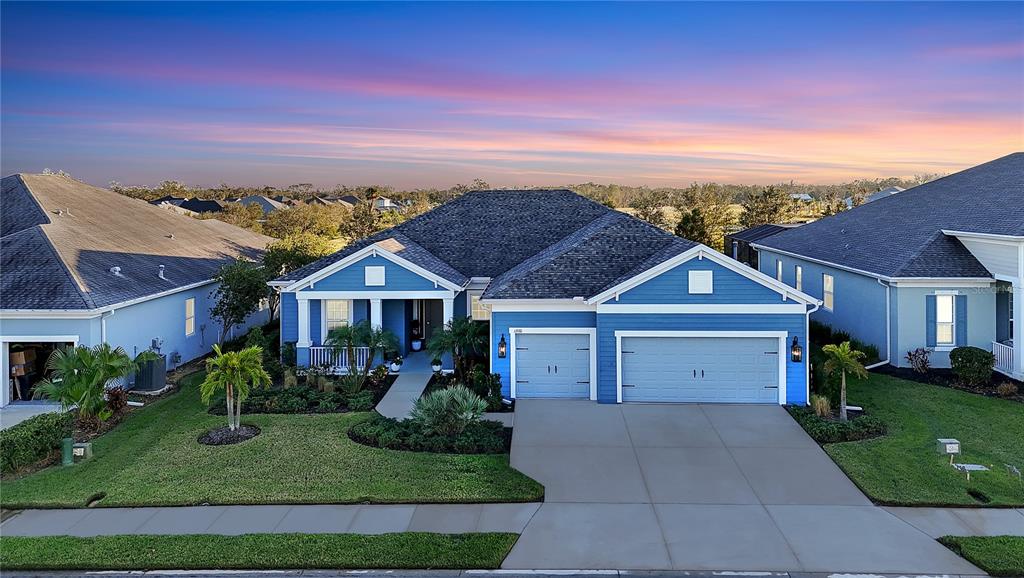 front view of a house with a yard