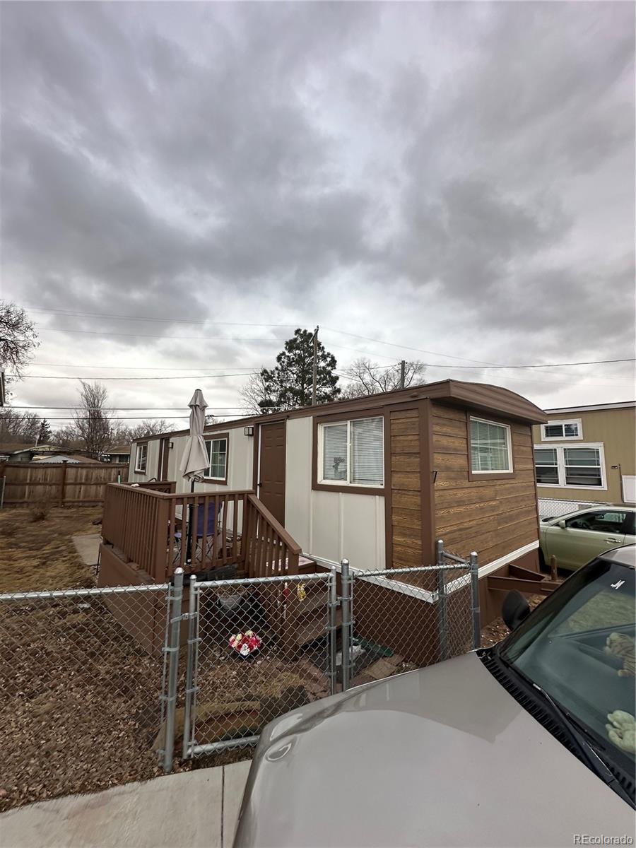 a view of a house with a street