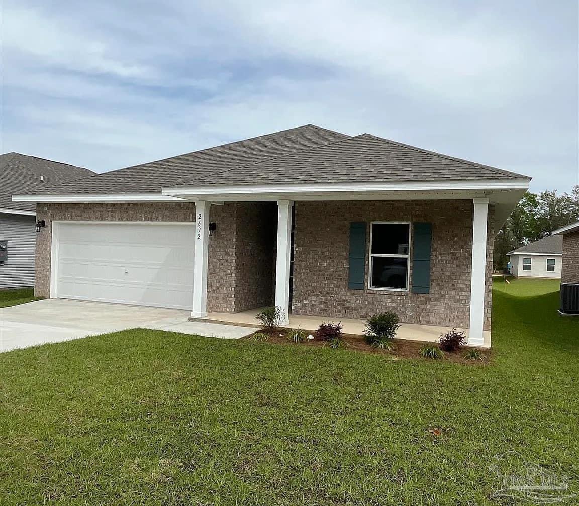 a front view of house with yard