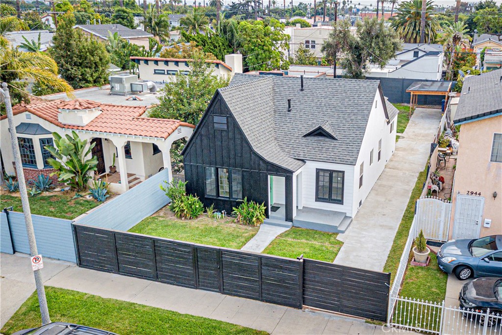 an aerial view of a house with swimming pool