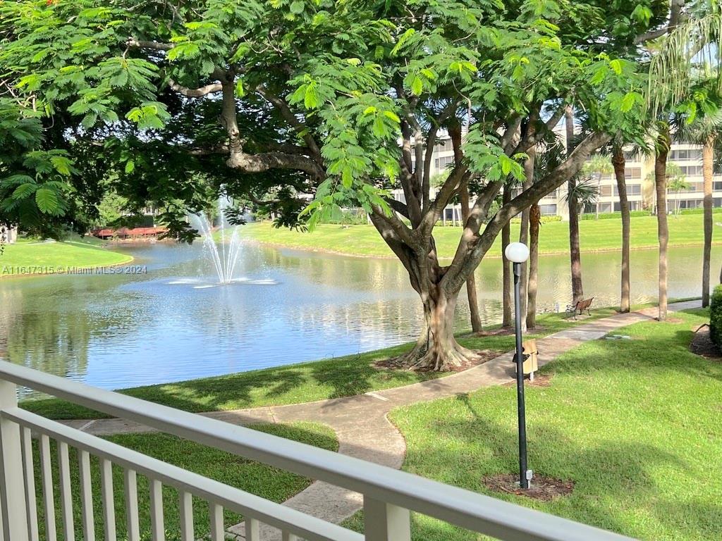 a view of a backyard of the house