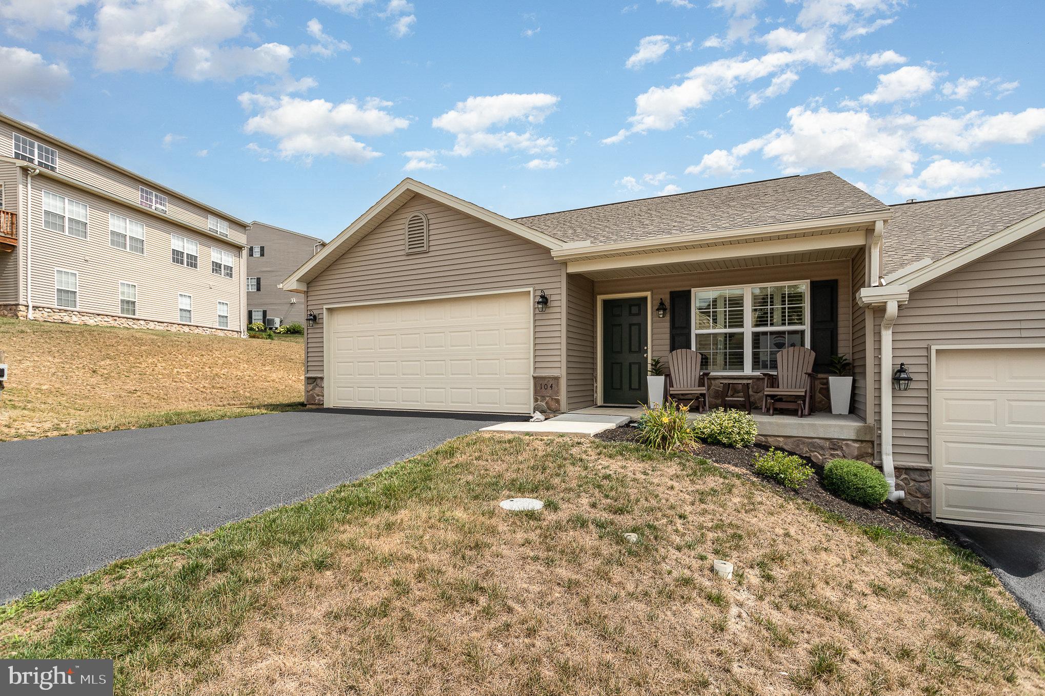 a house with yard in front of it