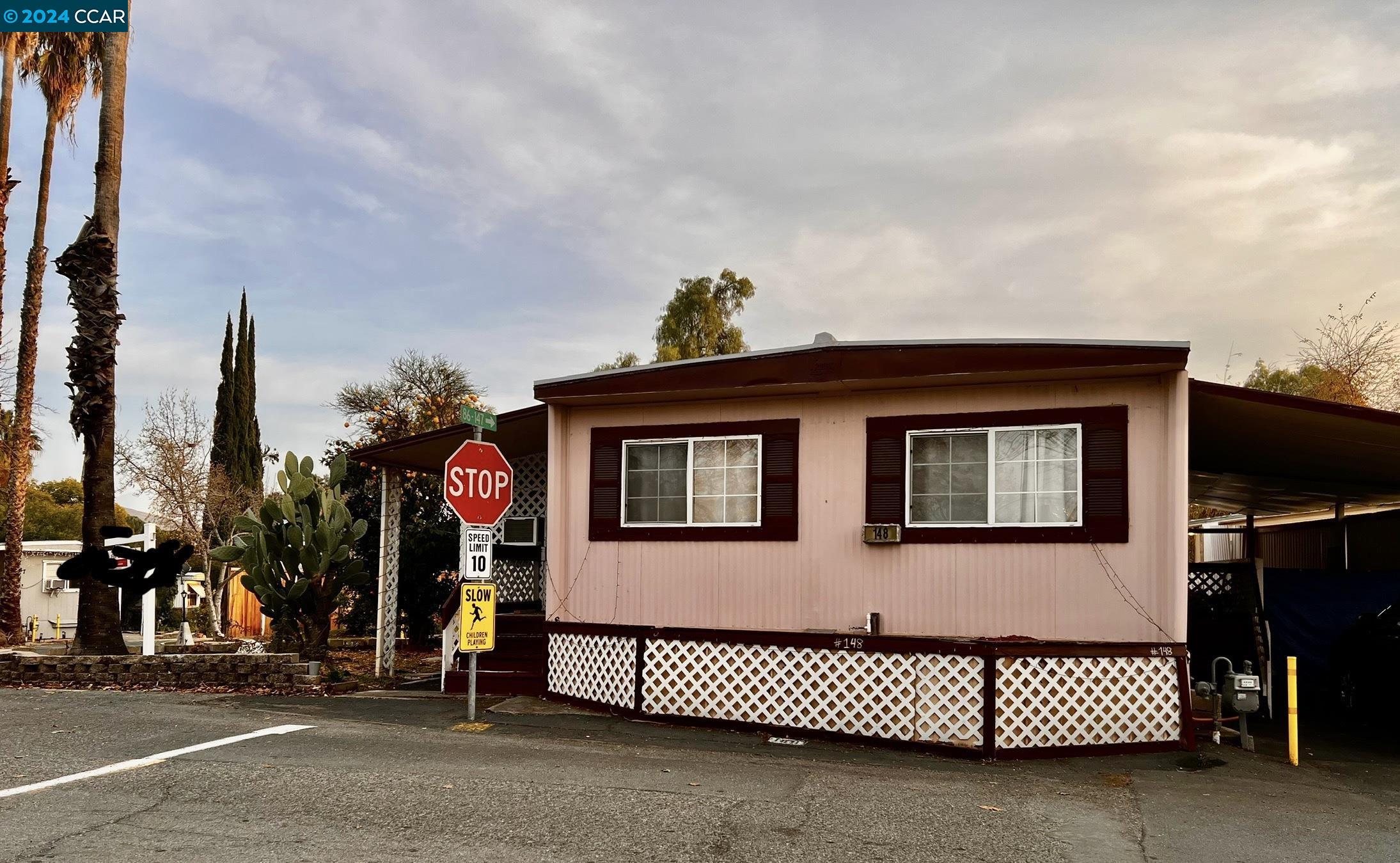 a front view of a house with a garage