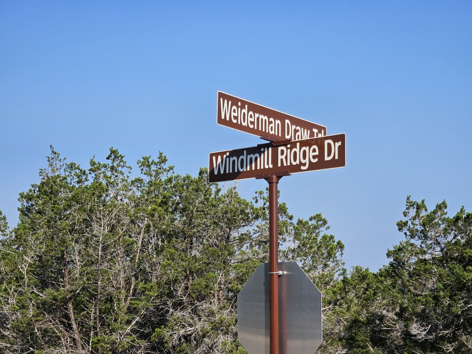 a street sign that is on a pole