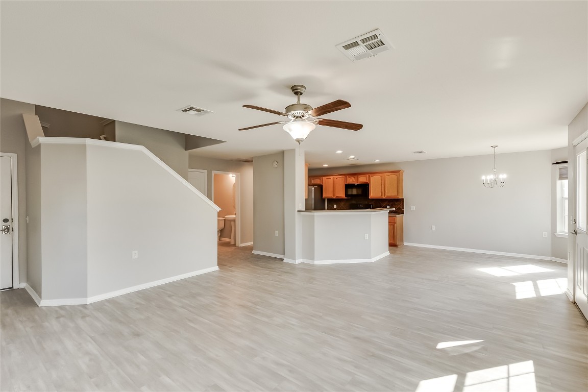 a view of a livingroom with a ceiling fan