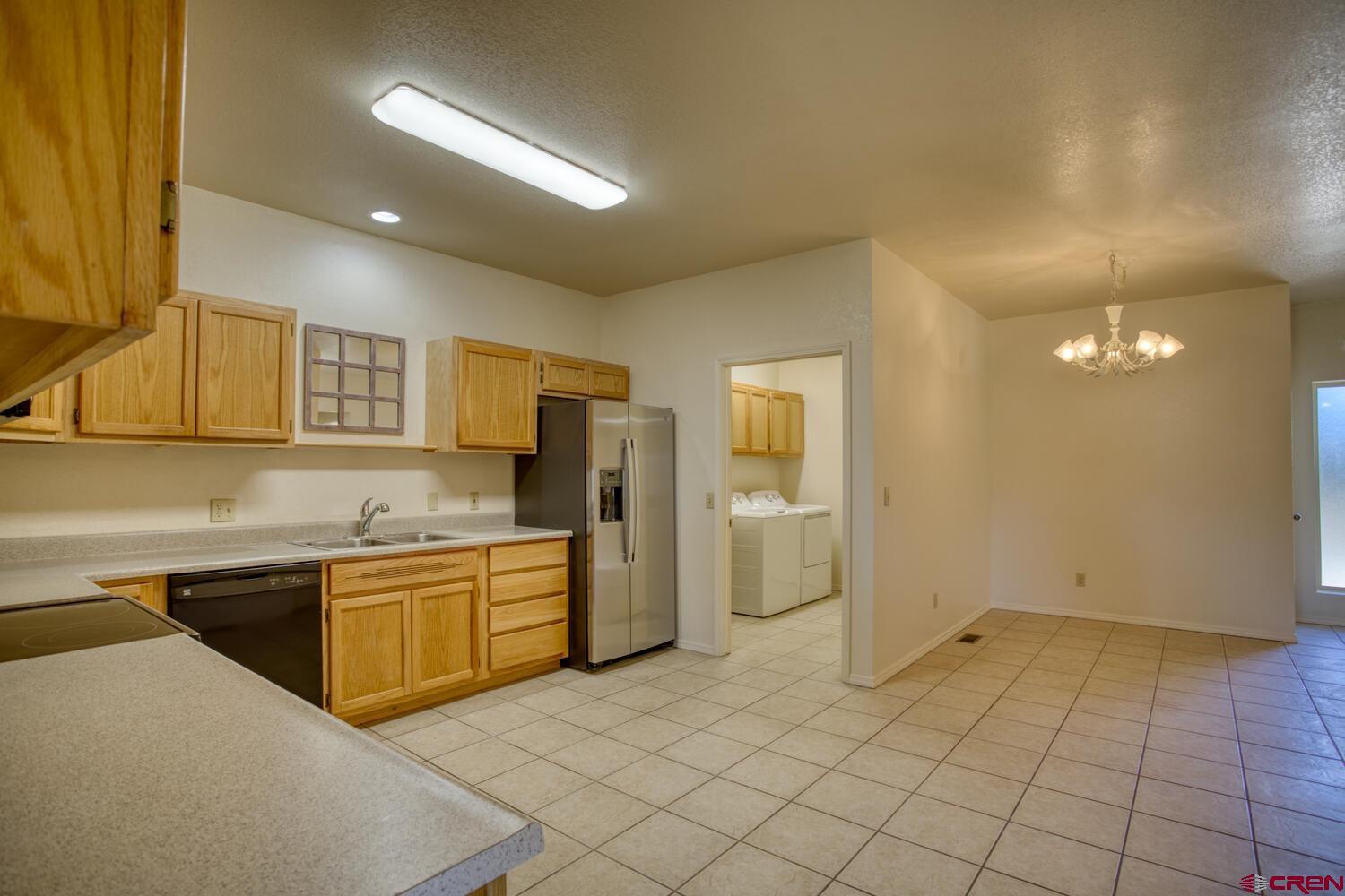 a view of a kitchen with a sink