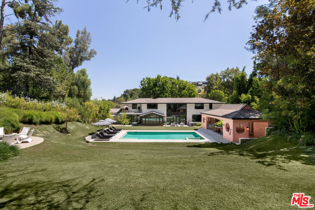 a view of a house with a big yard