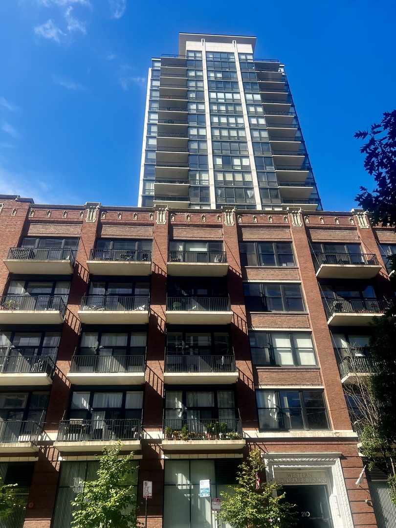 a front view of a building with balcony