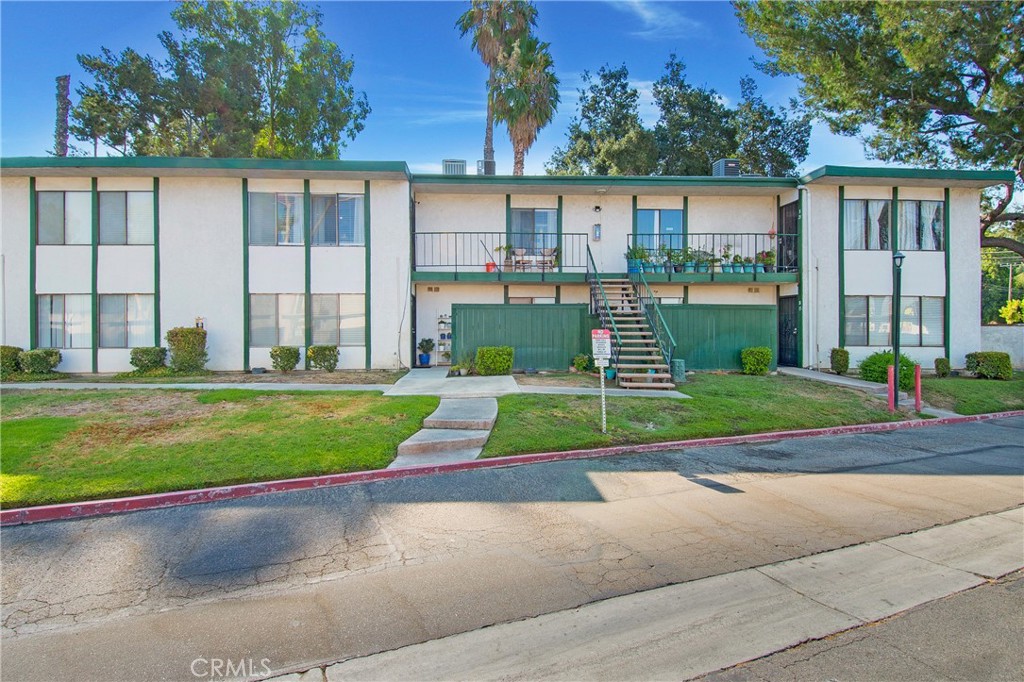 a view of backyard with green space