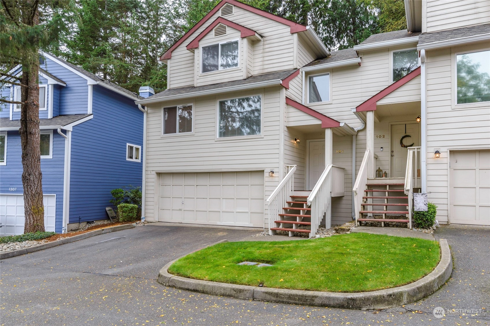 front view of a house with a yard