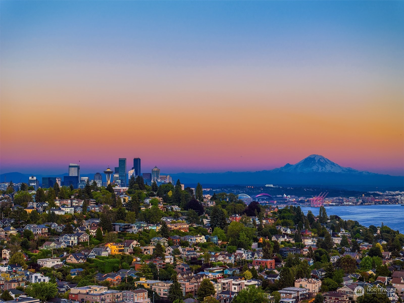 a view of a city with sunset