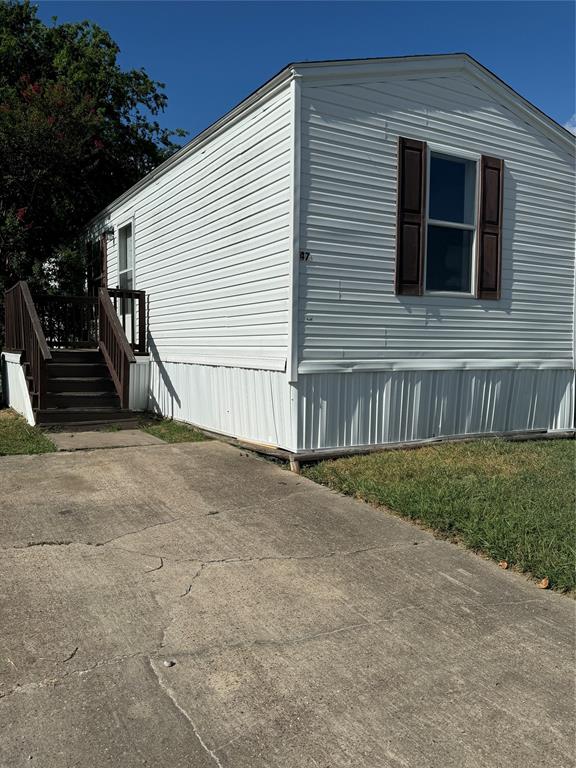 a view of backyard of house