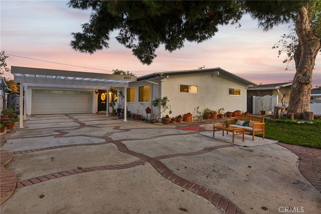 front view of a house with a patio