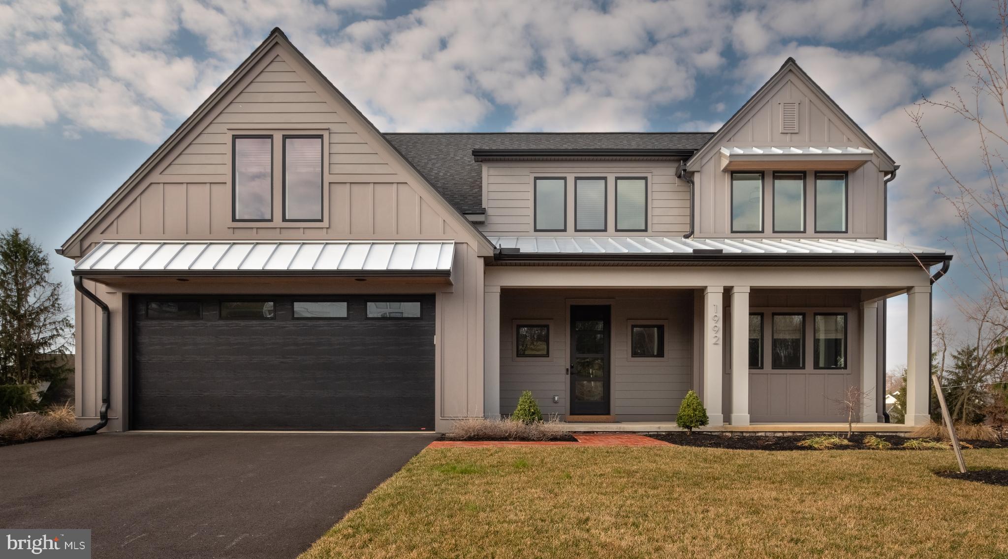 a front view of a house with yard