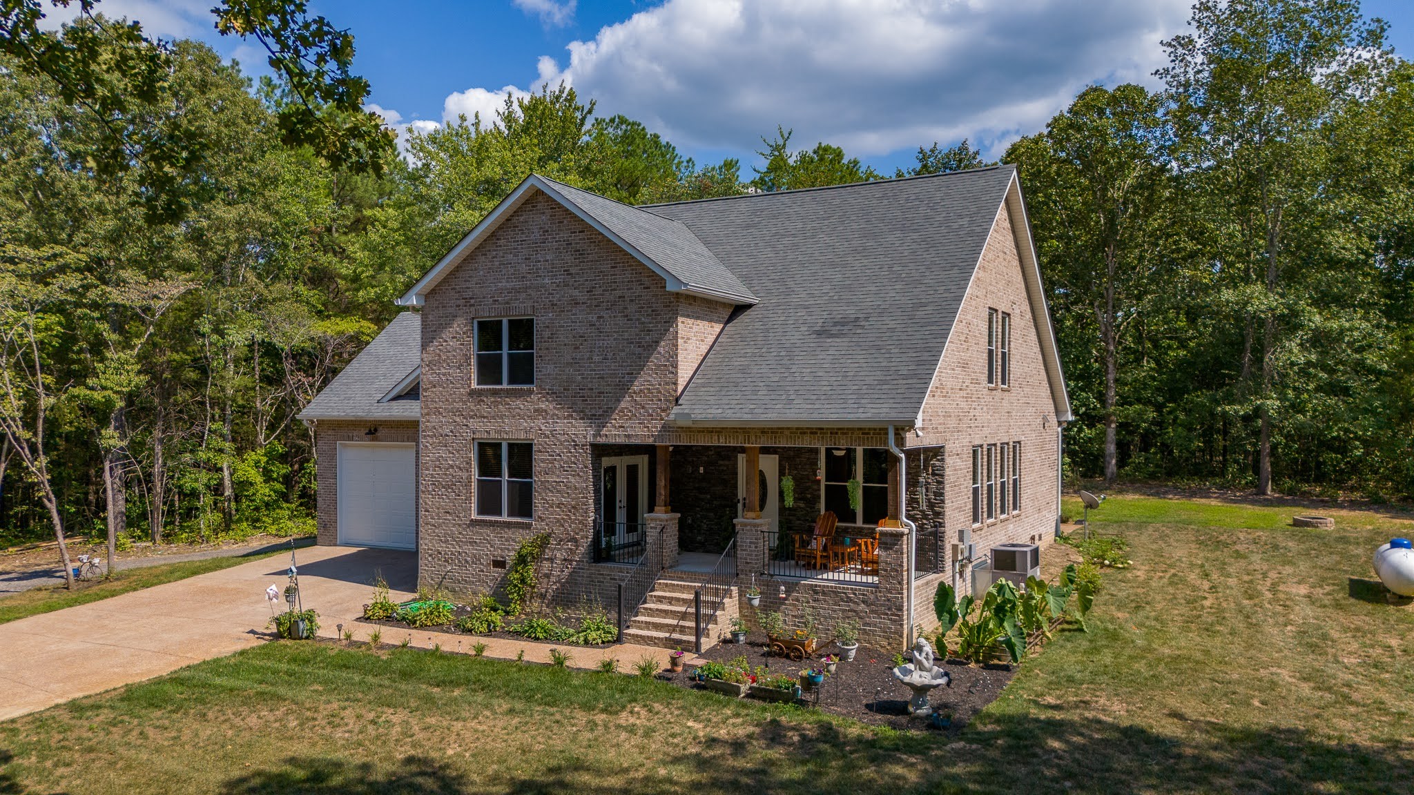 front view of a house with a yard