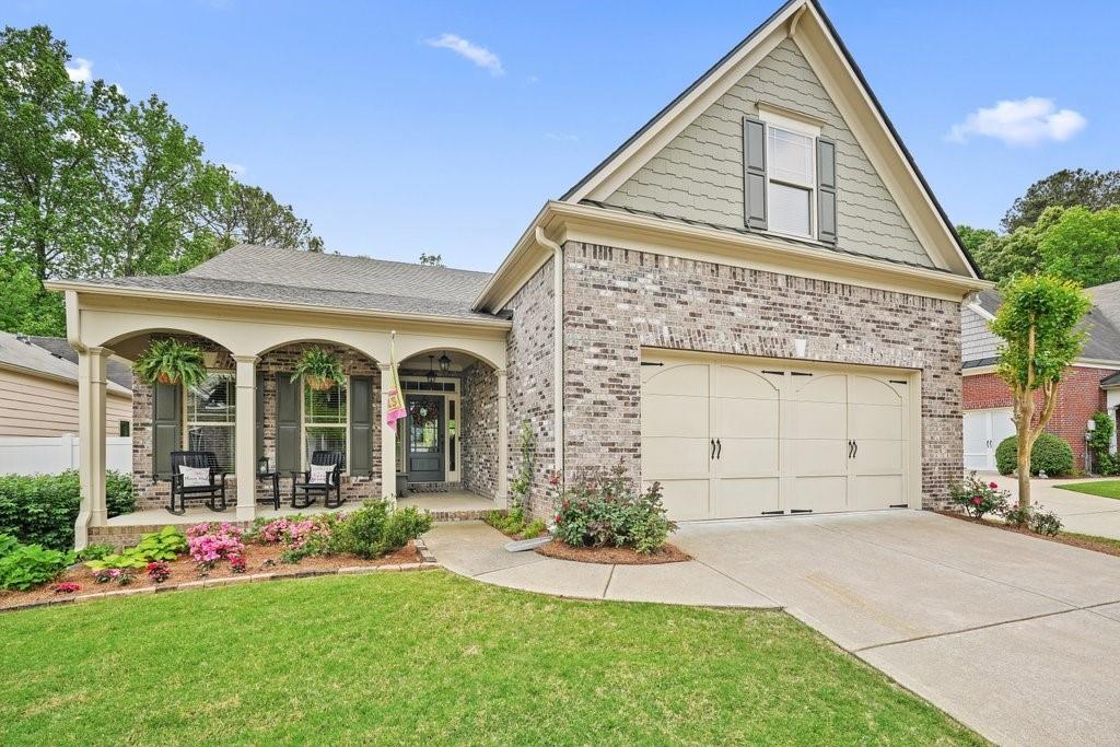 front view of a house with a yard