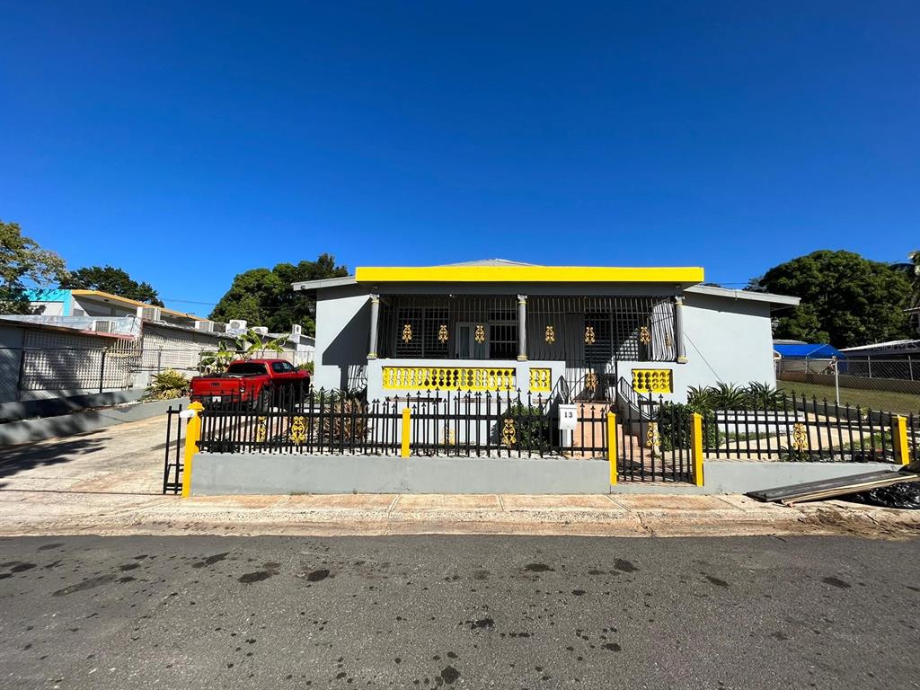 a view of house with a street