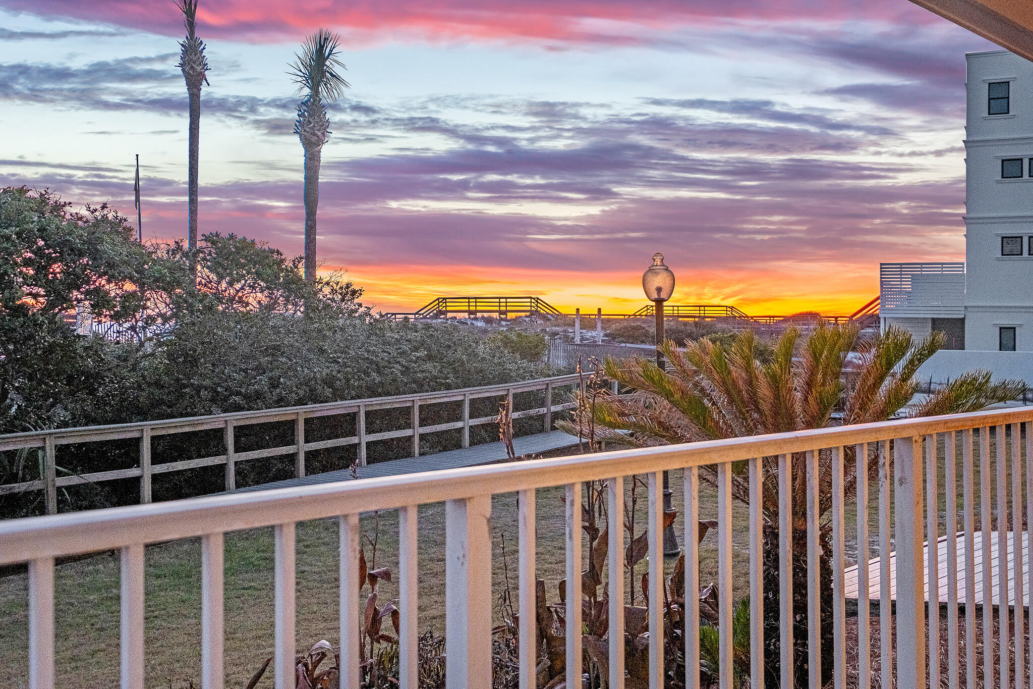 a view of a balcony with a ocean view