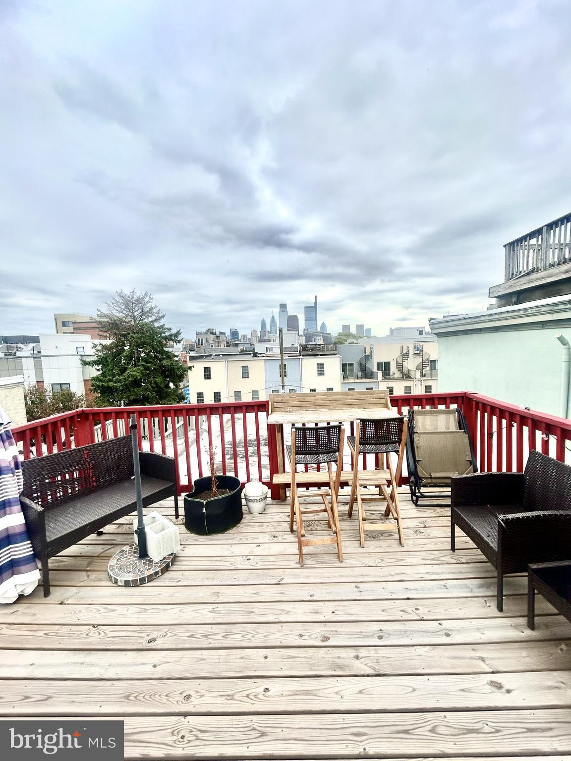 a view of a chairs and table on the terrace