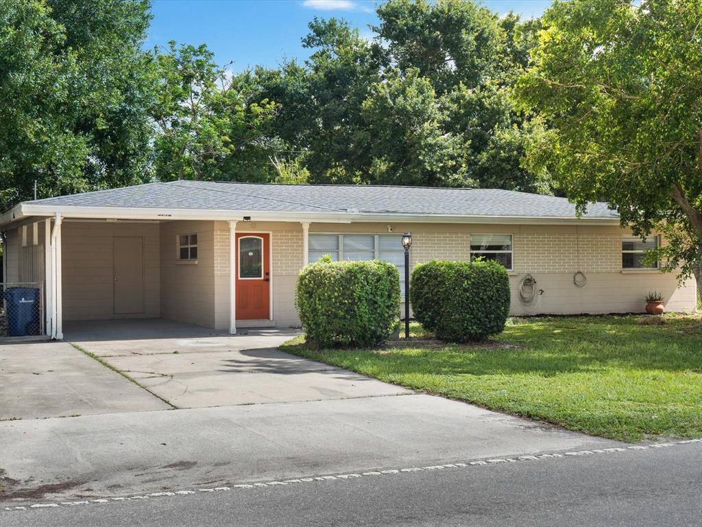 a house with a tree in front of it