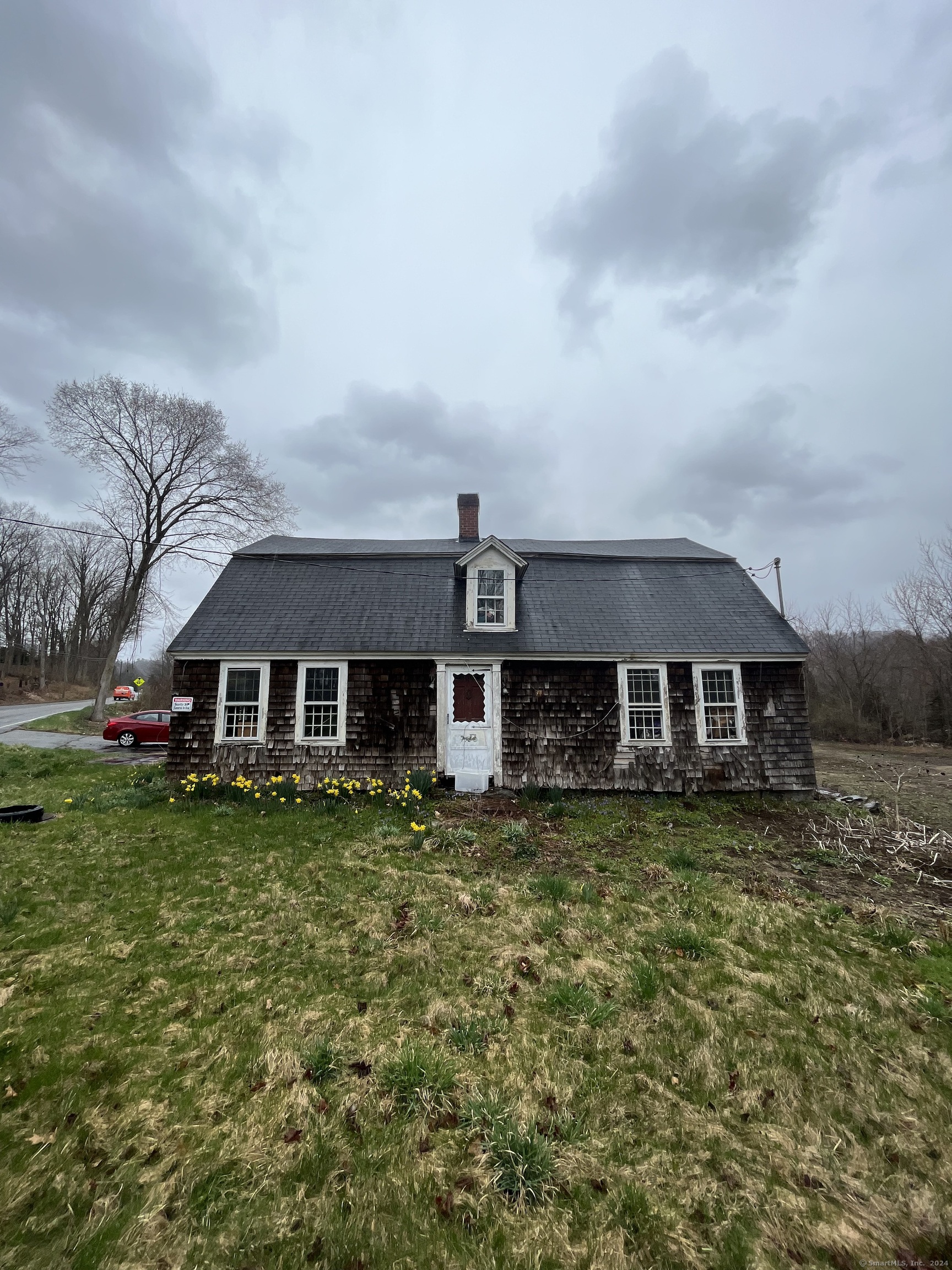 front view of a house with a yard