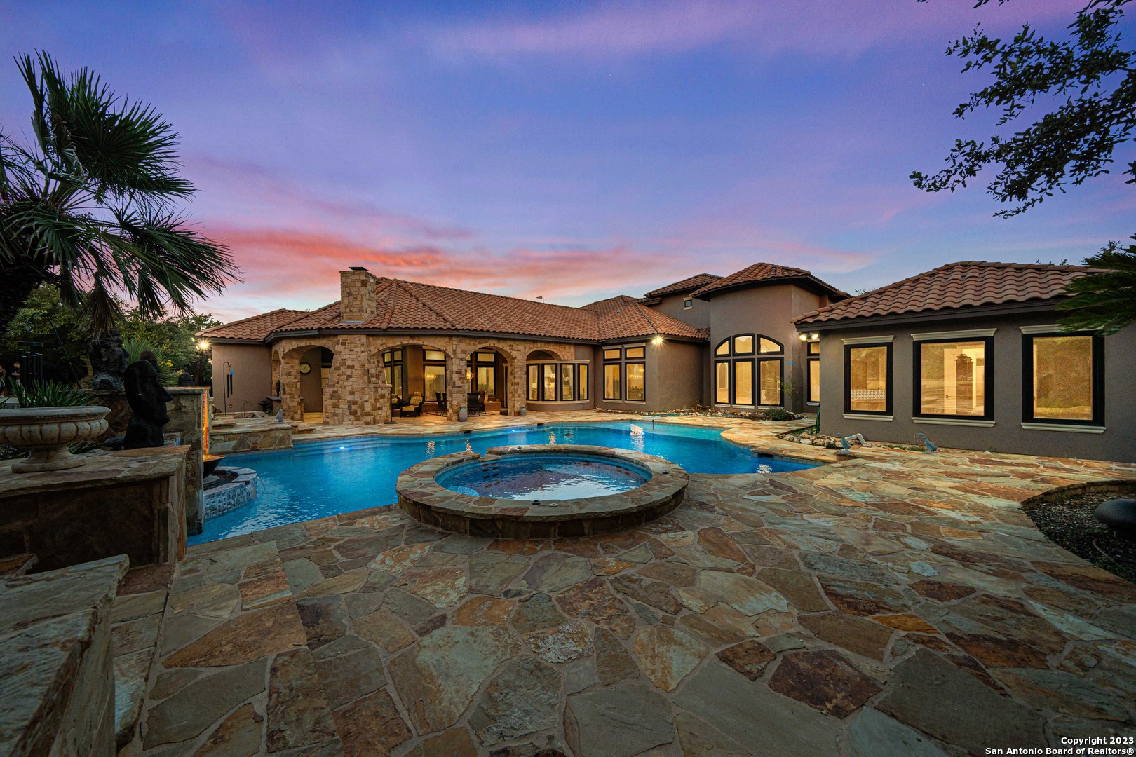 a front view of a house with swimming pool