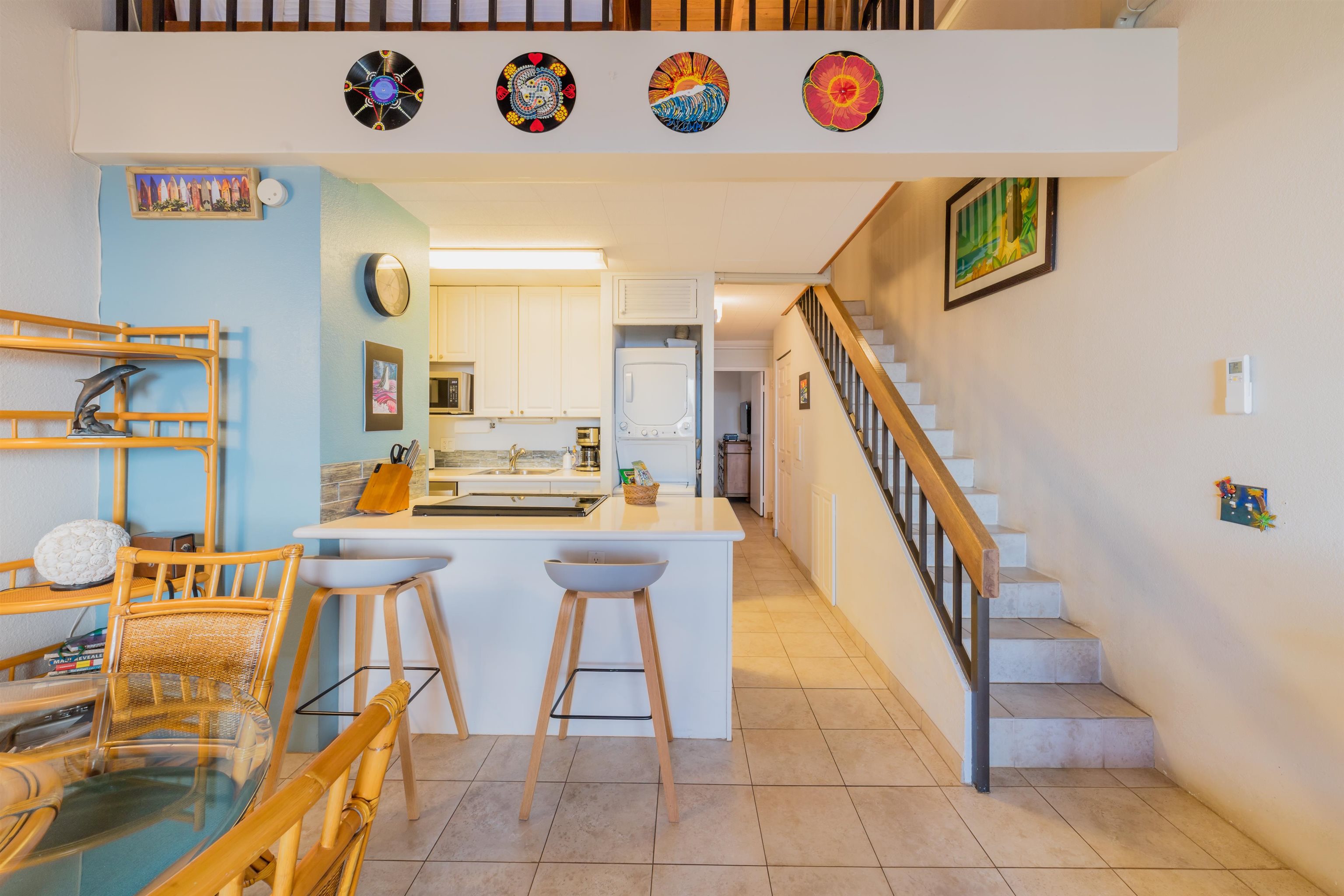 a dining room with a table and chairs