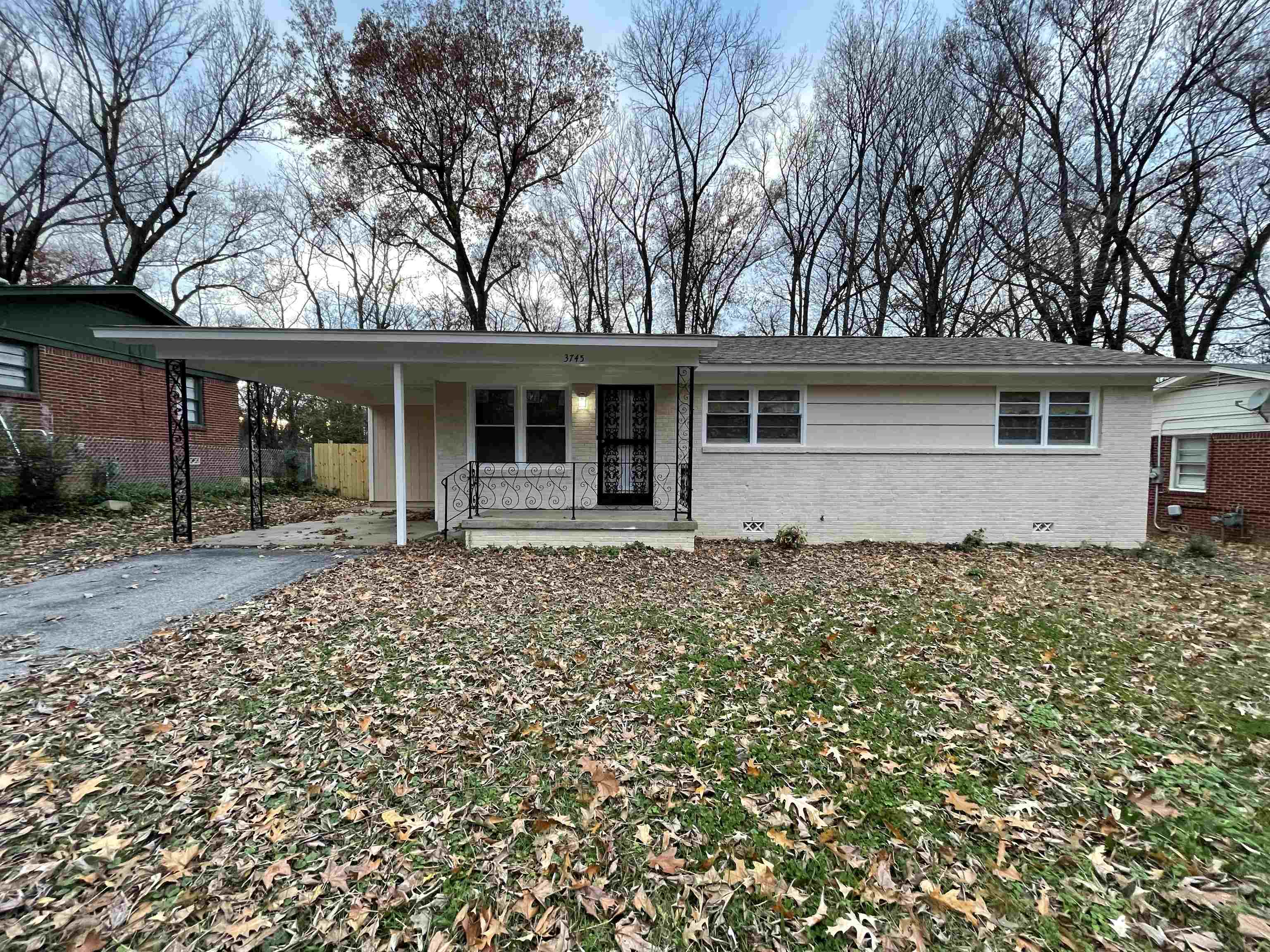 front view of house with a yard