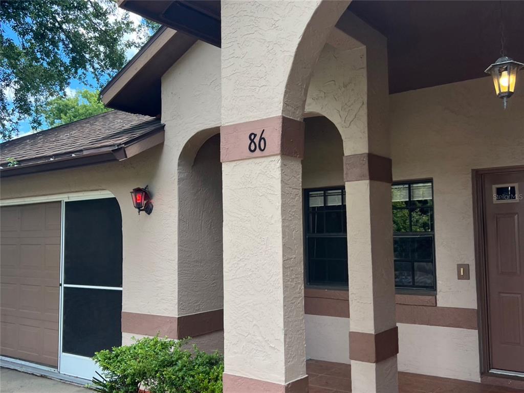 a front view of a house with entryway