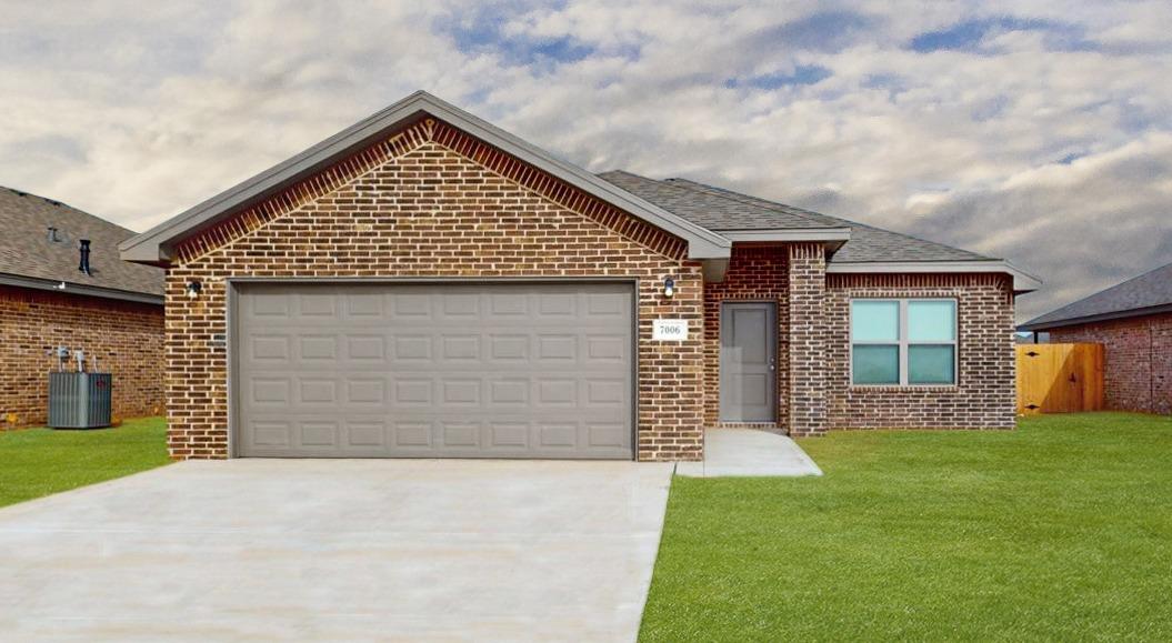 a front view of house with yard