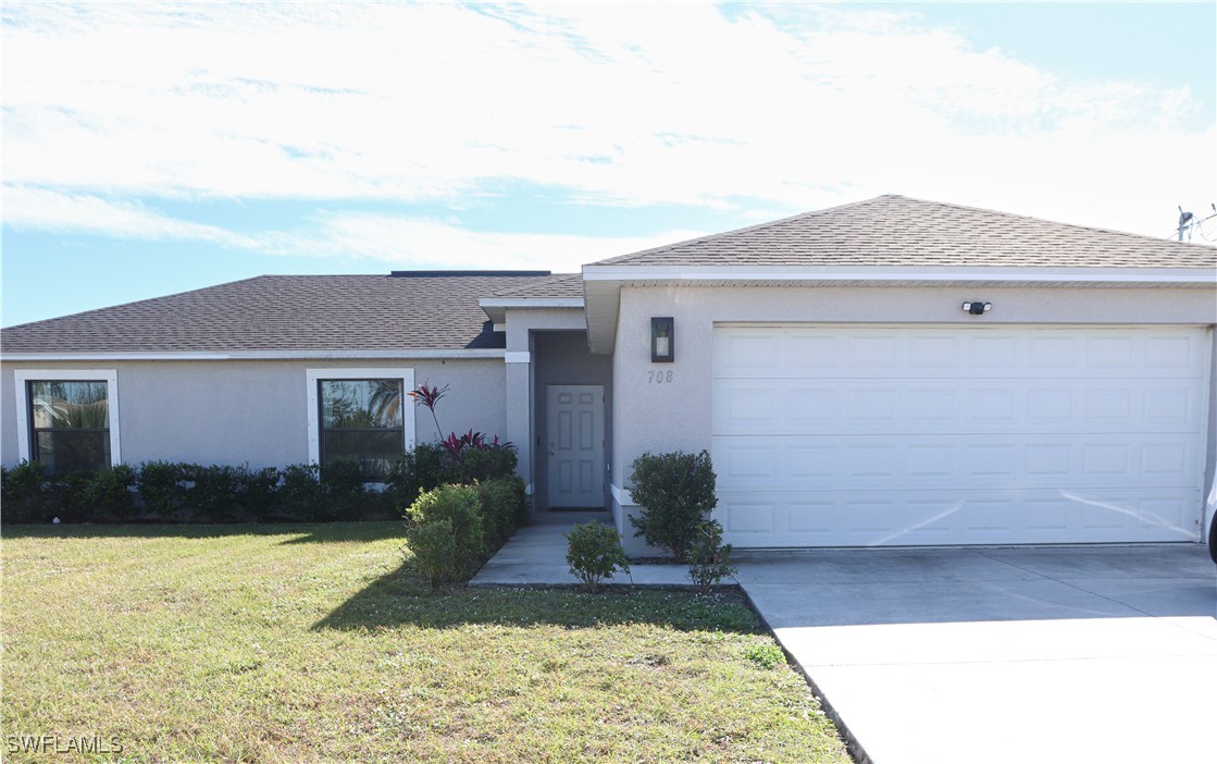 a front view of house with yard