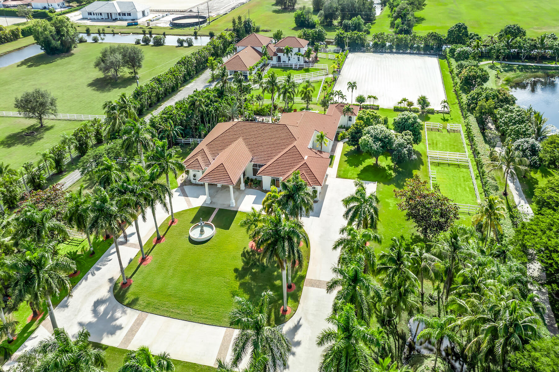 an aerial view of a house with a garden