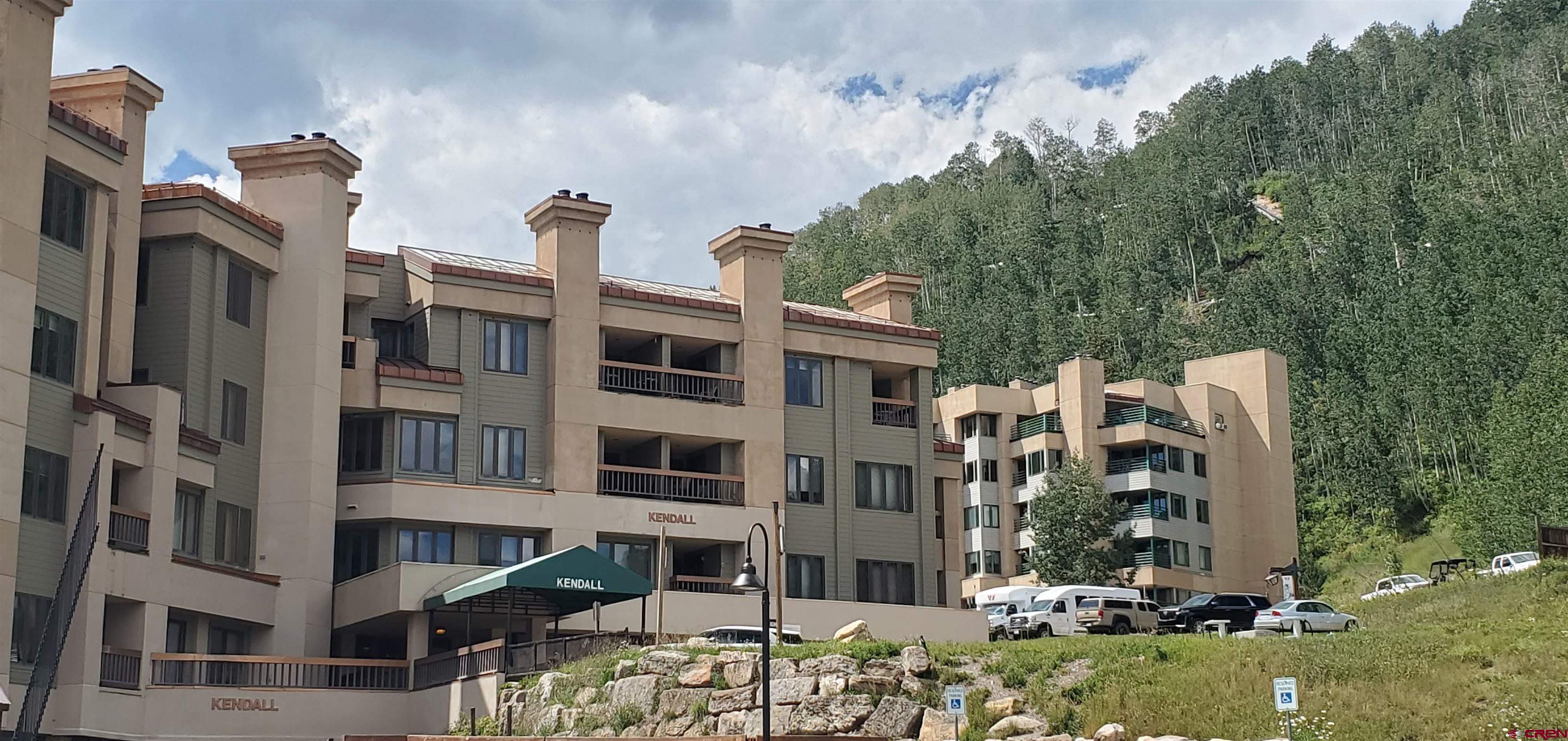 a front view of a building with street view