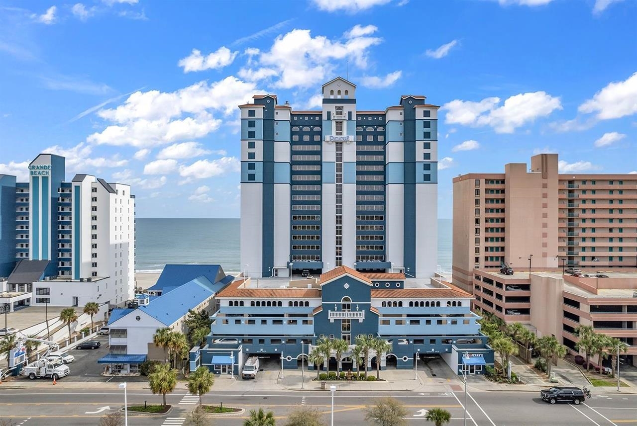 Property's view of city featuring a water view