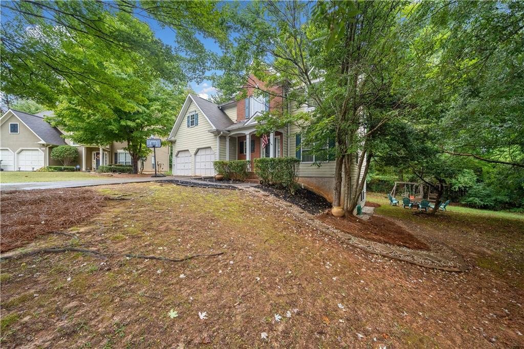 a house with a tree in front of it