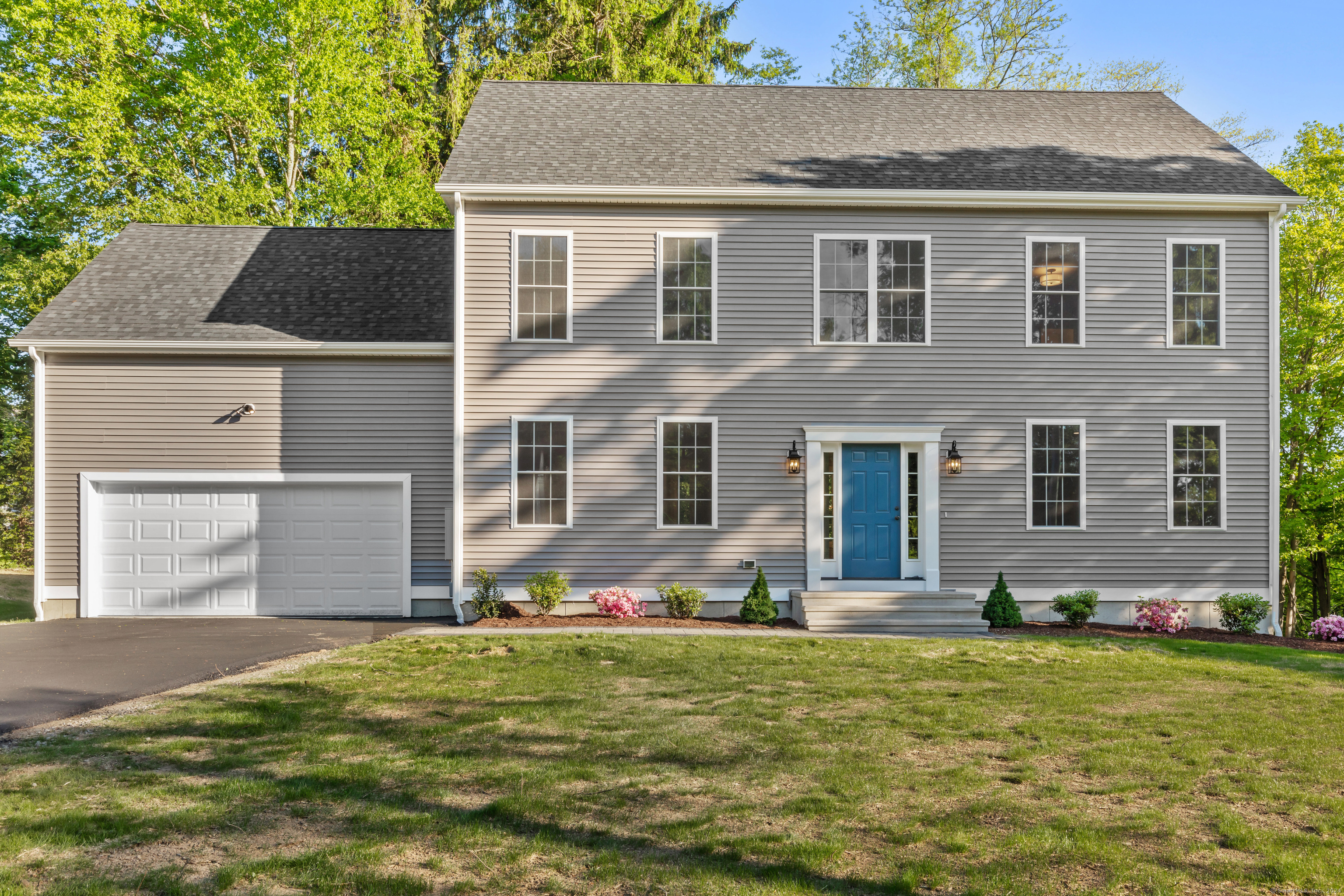 a front view of house with yard