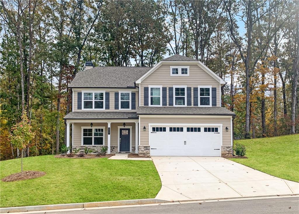 front view of a house with a yard