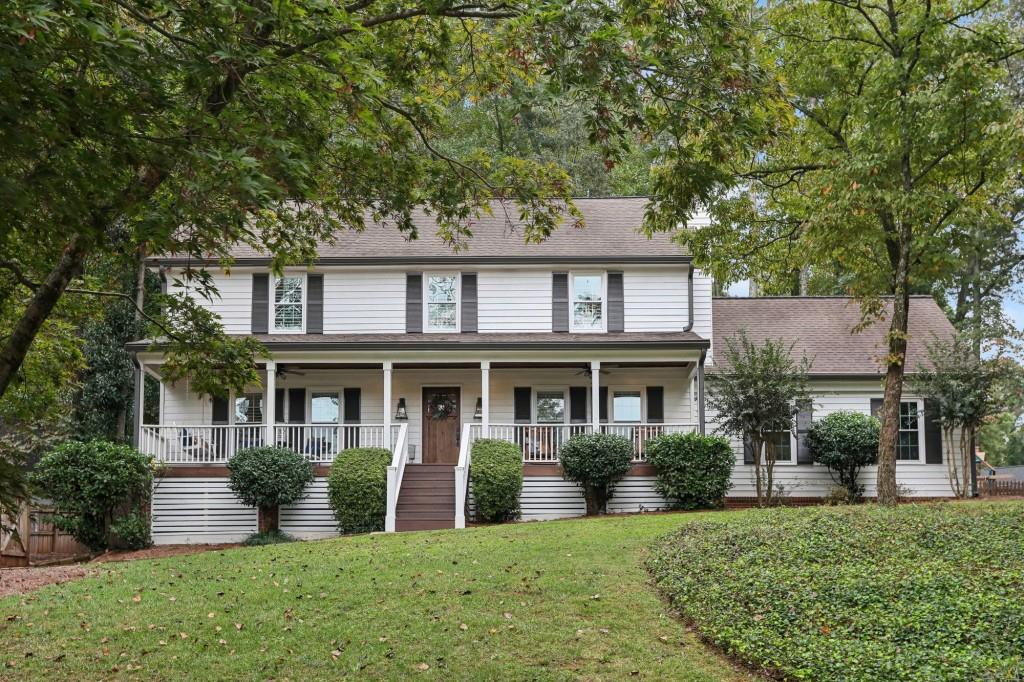 front view of a house with a yard