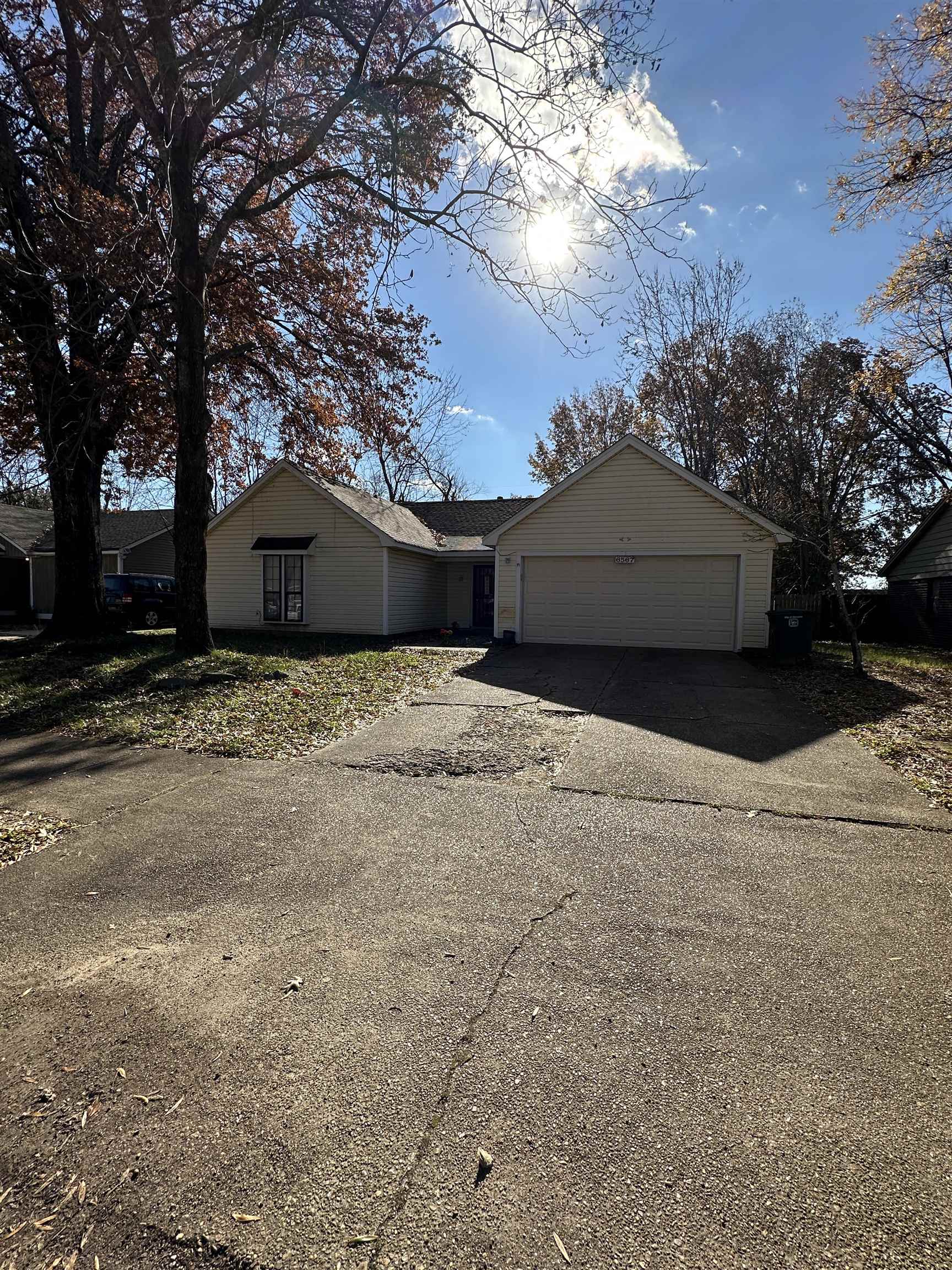 a house with trees in front of it