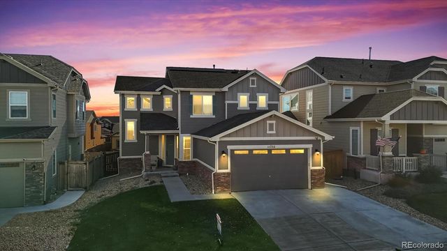 $849,900 | 11732 West Quarles Avenue | Summit Ridge at West Meadows