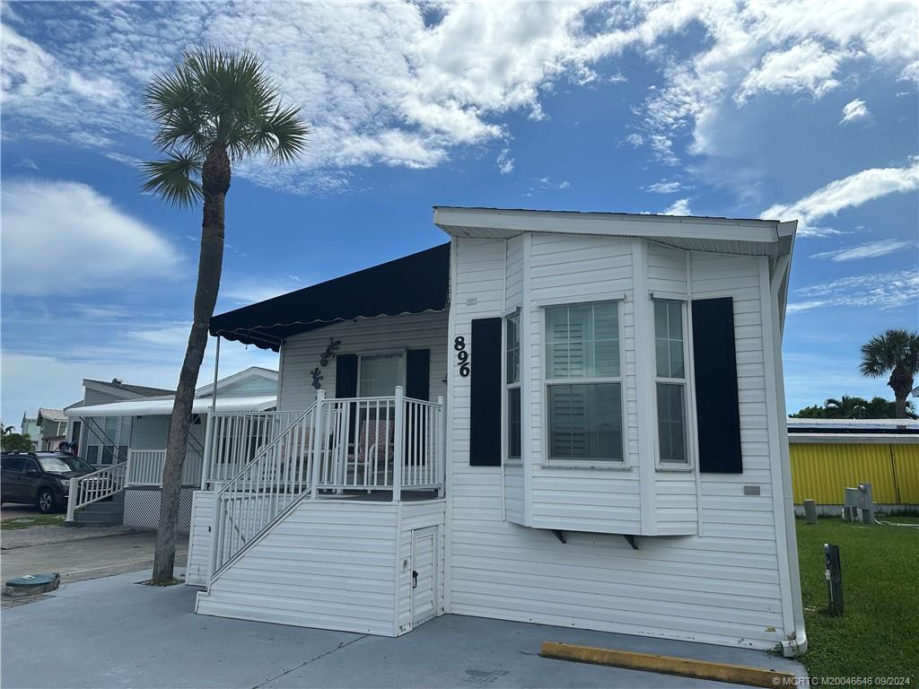 a front view of a house with garage