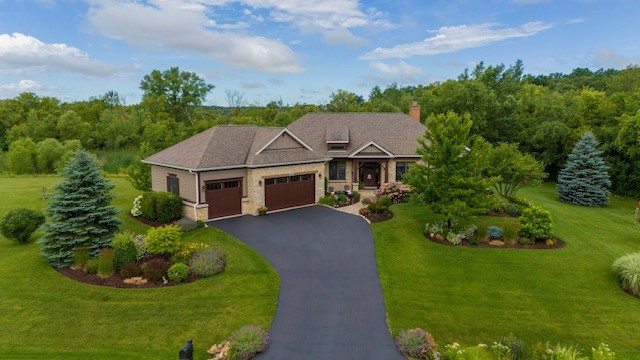 a aerial view of a house with garden