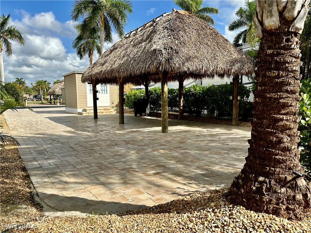 a view of a swimming pool with a patio