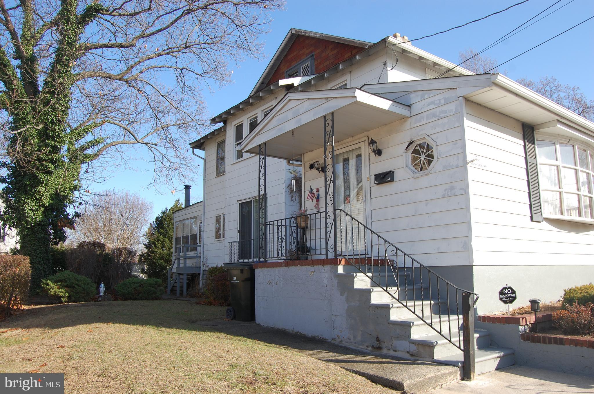 a view of a house with a street