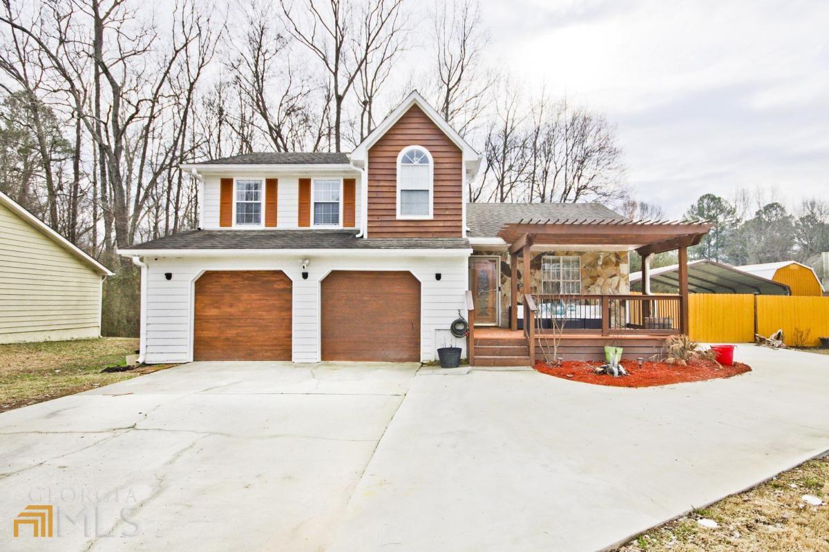 a front view of a house with entertaining space