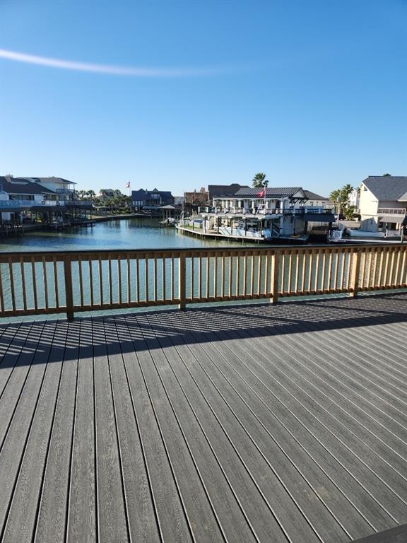 a view of balcony with wooden floor