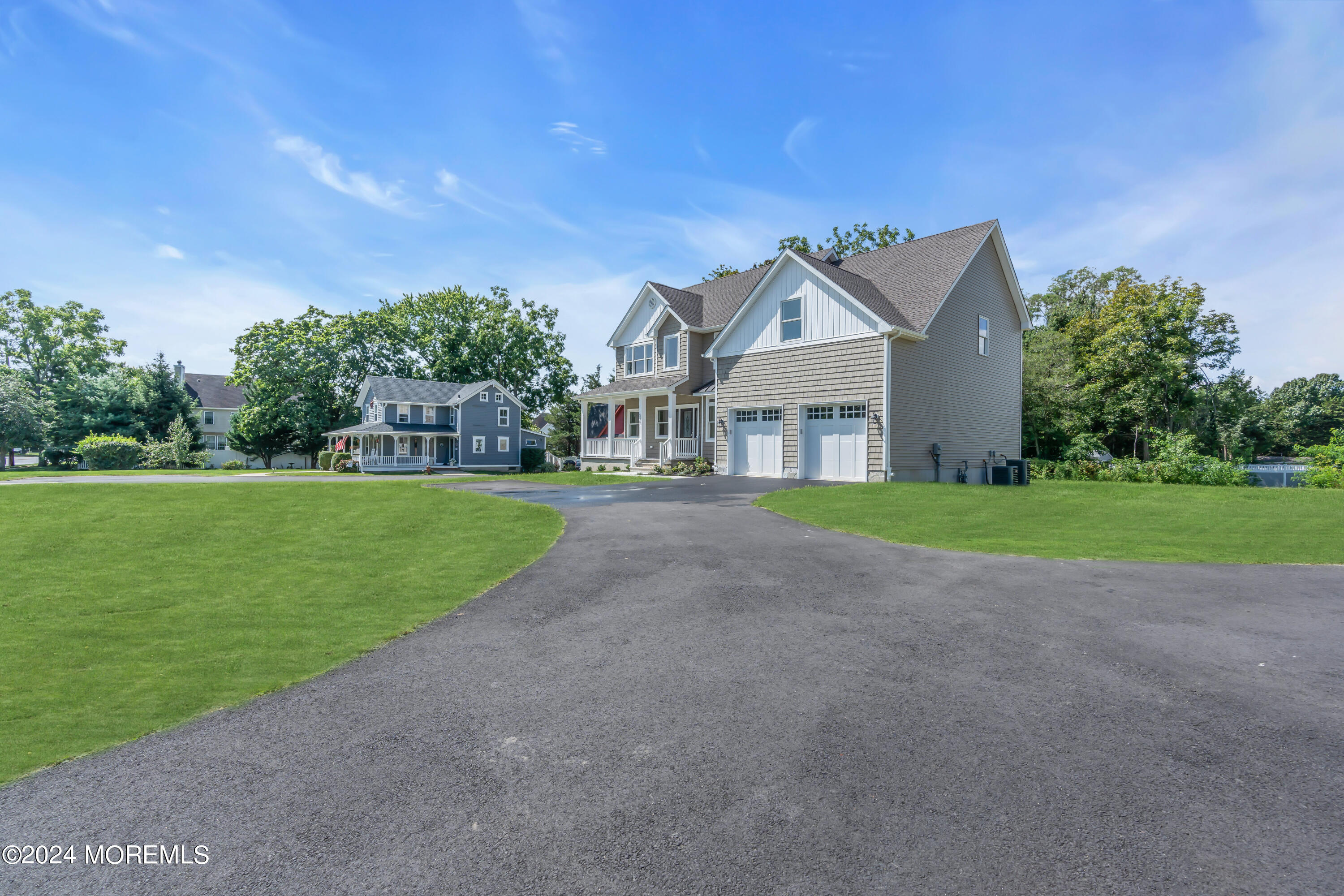 a view of a house with a big yard