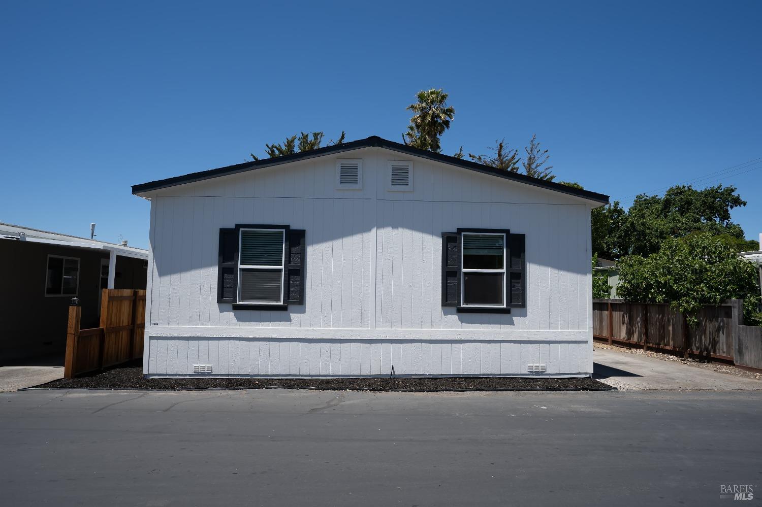 a front view of a house with a garage