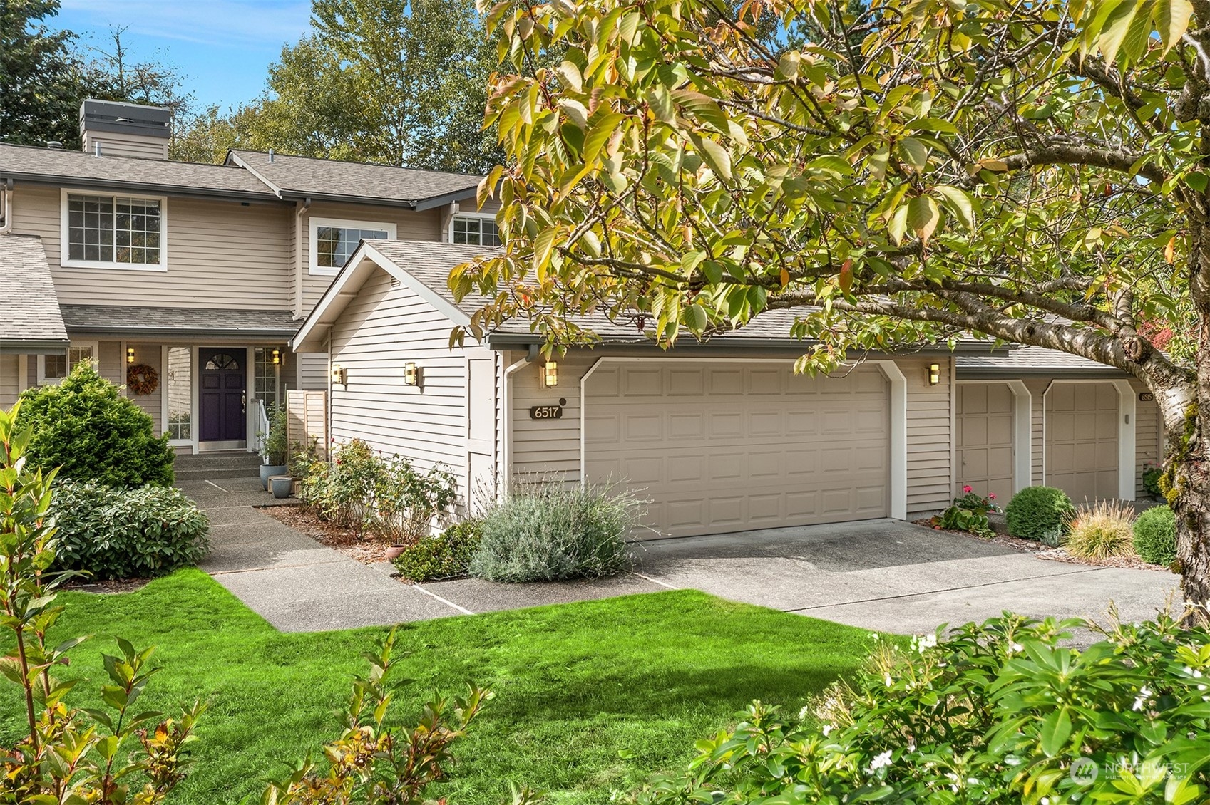 front view of a house with a yard